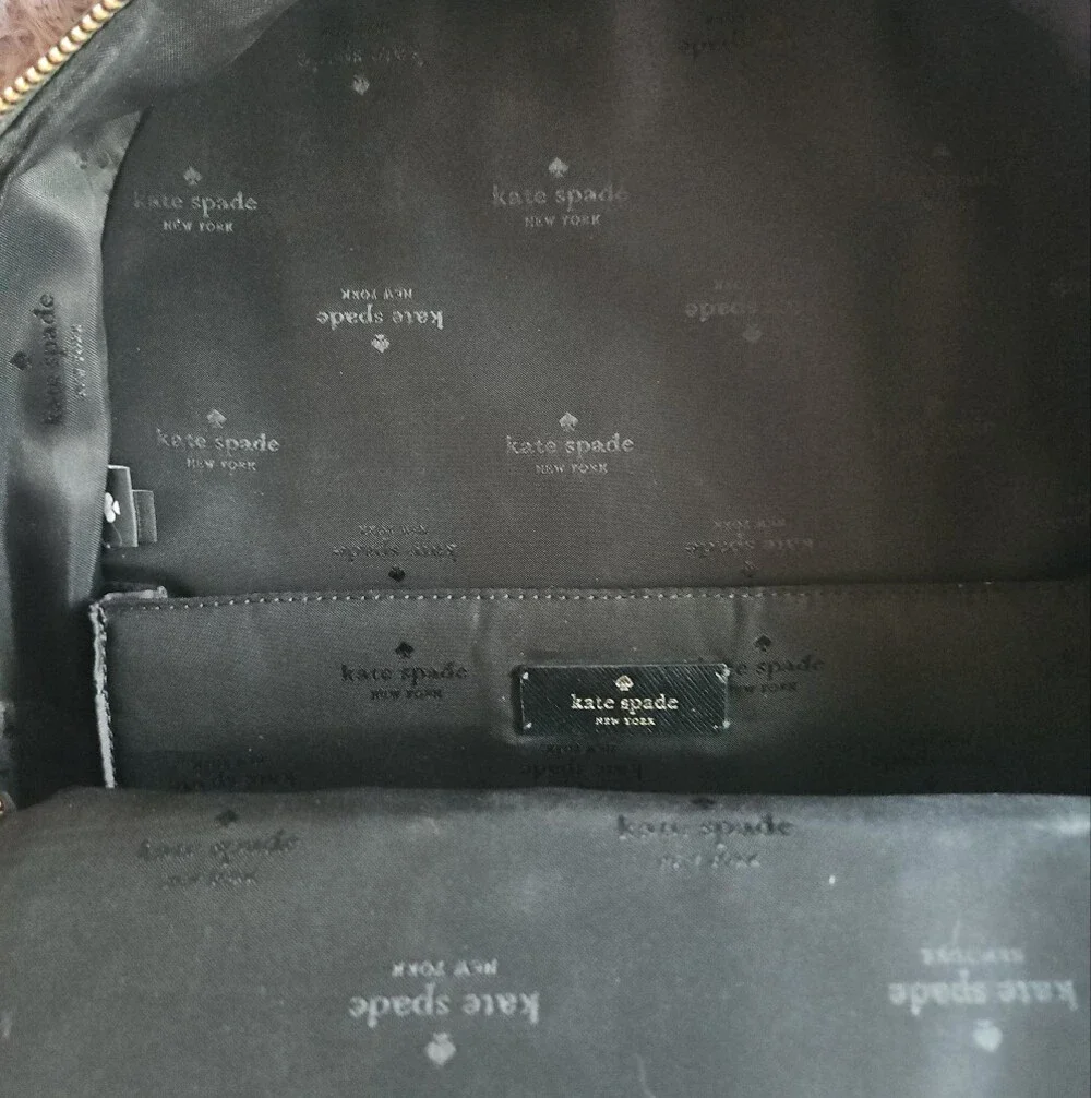 AS-IS Kate Spade black leather backpack LEFT STRAP AT THE TOP TORN. STILL NEW